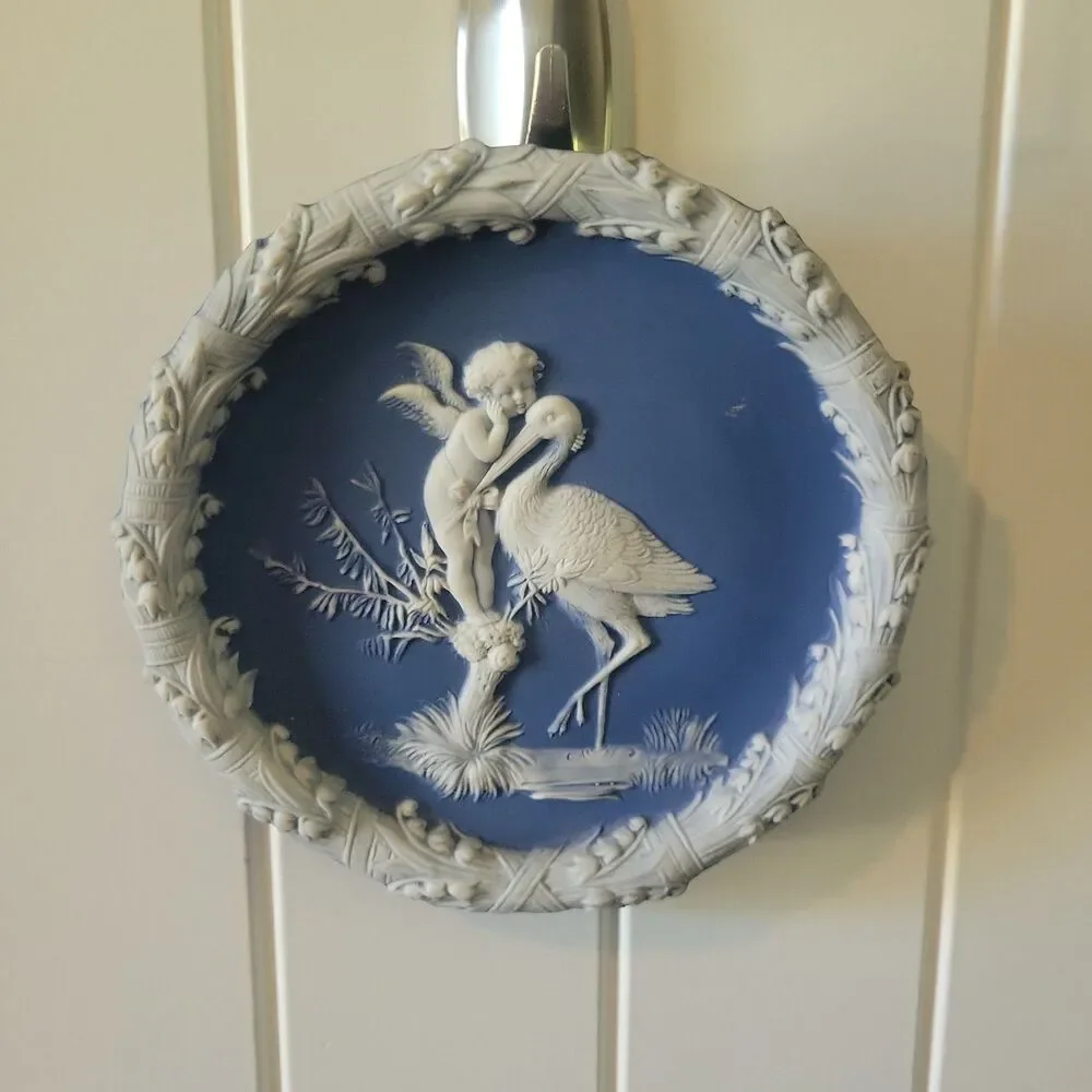 Schafer & Vater Blue & White Jasperware Plaque Featuring a Cherub & Stork Lily